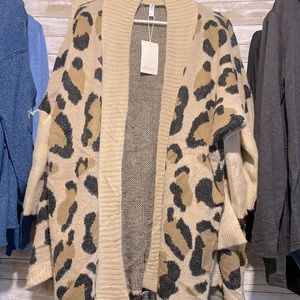ANIMAL PRINT BROWN CARDIGAN. NWT
